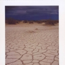 Death Valley. Cracked Floor near Dunes