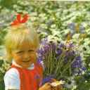 Child with summer flowers